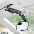 Sun visor phone mount clipped to a car sun visor holding a phone in landscape for GPS