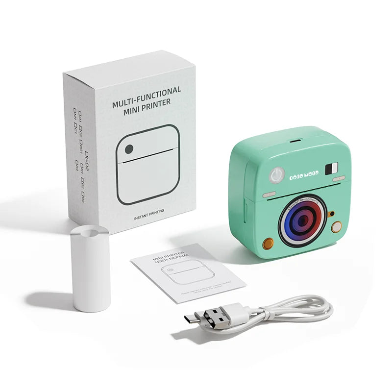 Camera-style mini thermal sticker printer with thermal paper roll, USB-C cable, manual and box