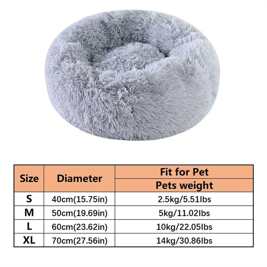 Calming donut dog bed in gray — long plush faux fur round cuddler with raised rim