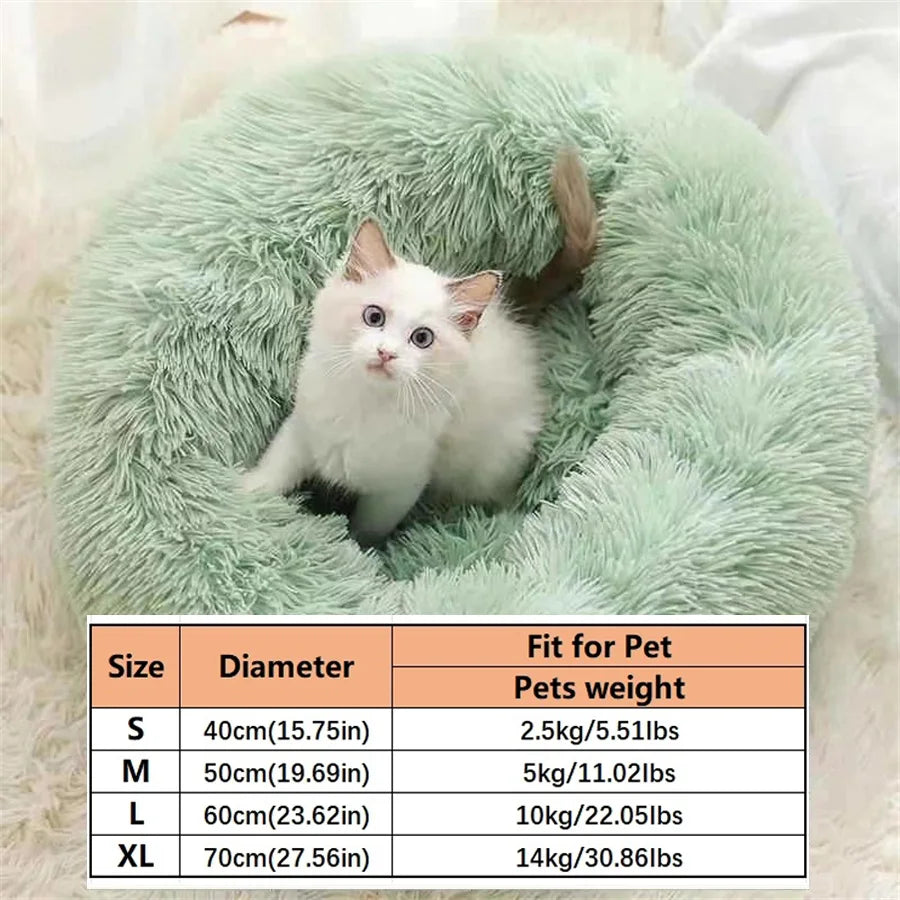 Calming donut dog bed in green — long plush faux fur round cuddler with raised rim