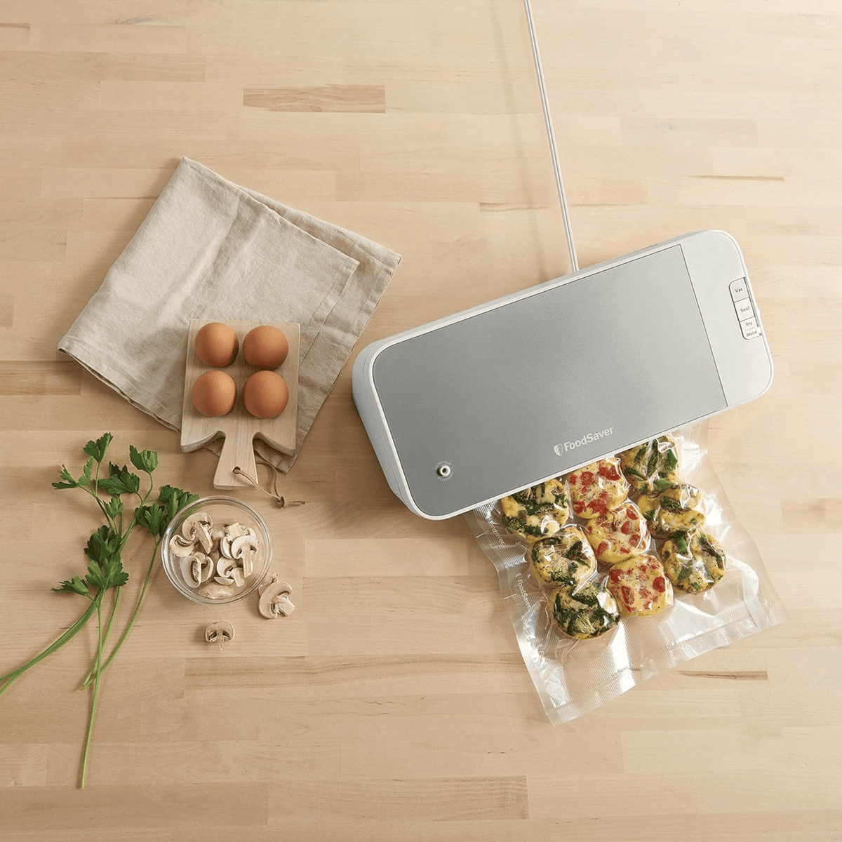 FoodSaver Food Sealer and Kit Vacuum Sealing System with Bonus Handheld Sealer